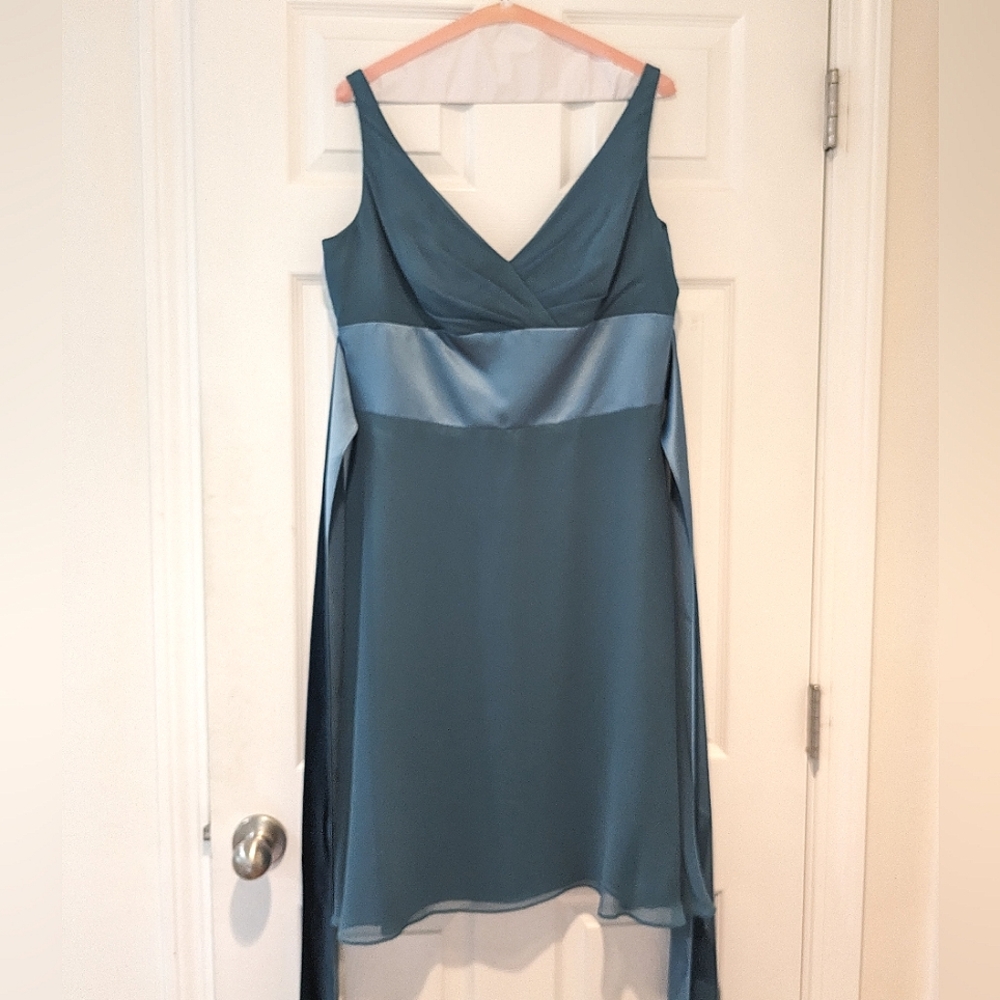 Jim Hjelm Occasions teal bridesmaids dress with satin ribbon